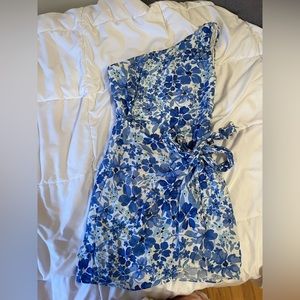 Blue one shoulder dress with a tie on the side